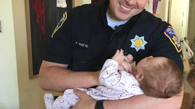 ih5uo-police-officer-adopts-baby
