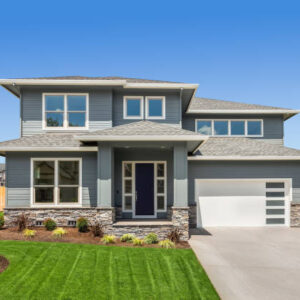 Facade of home with manicured lawn